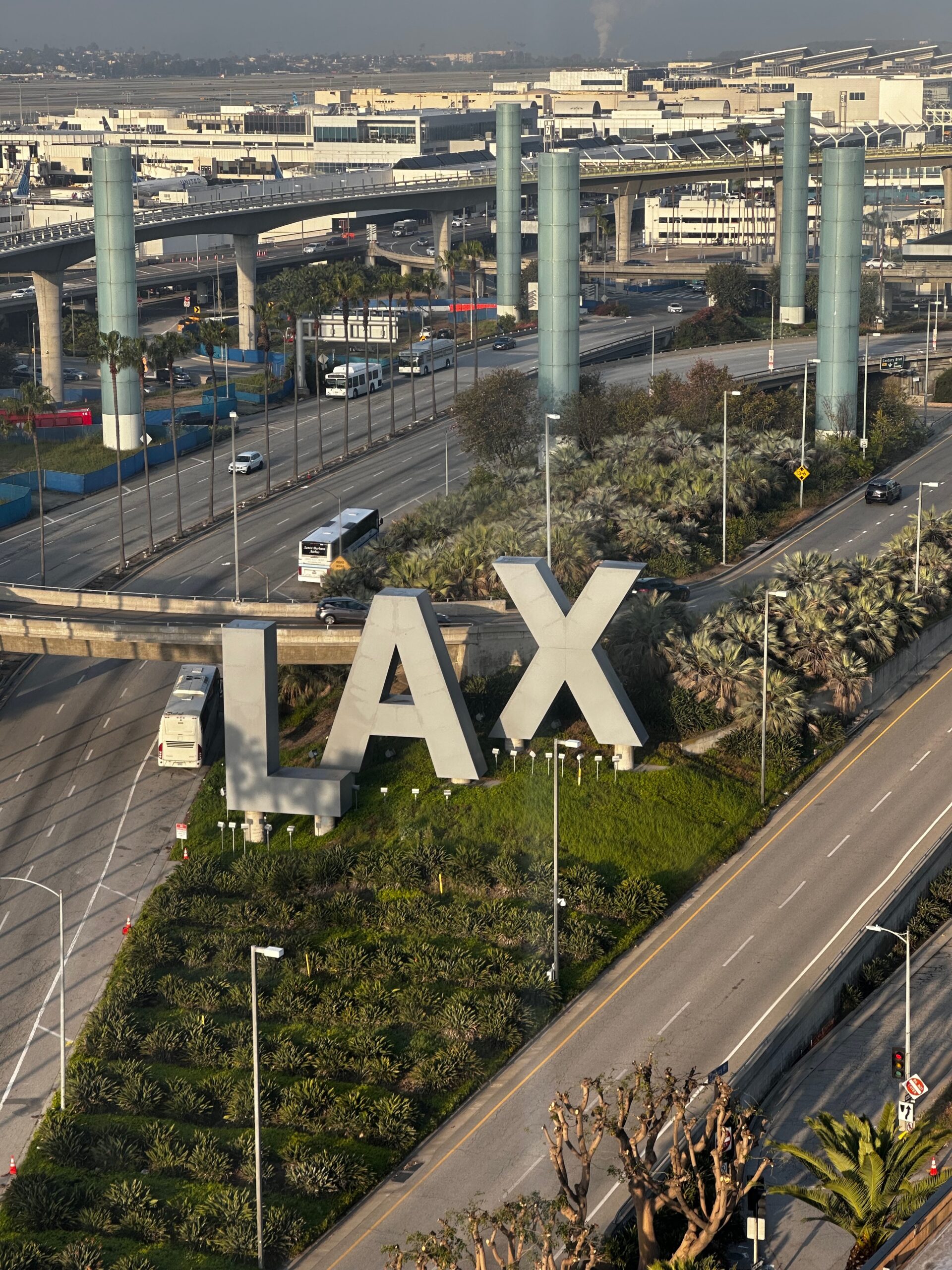 A picture of LAX airport sign from the Hilton hotel curio hotel